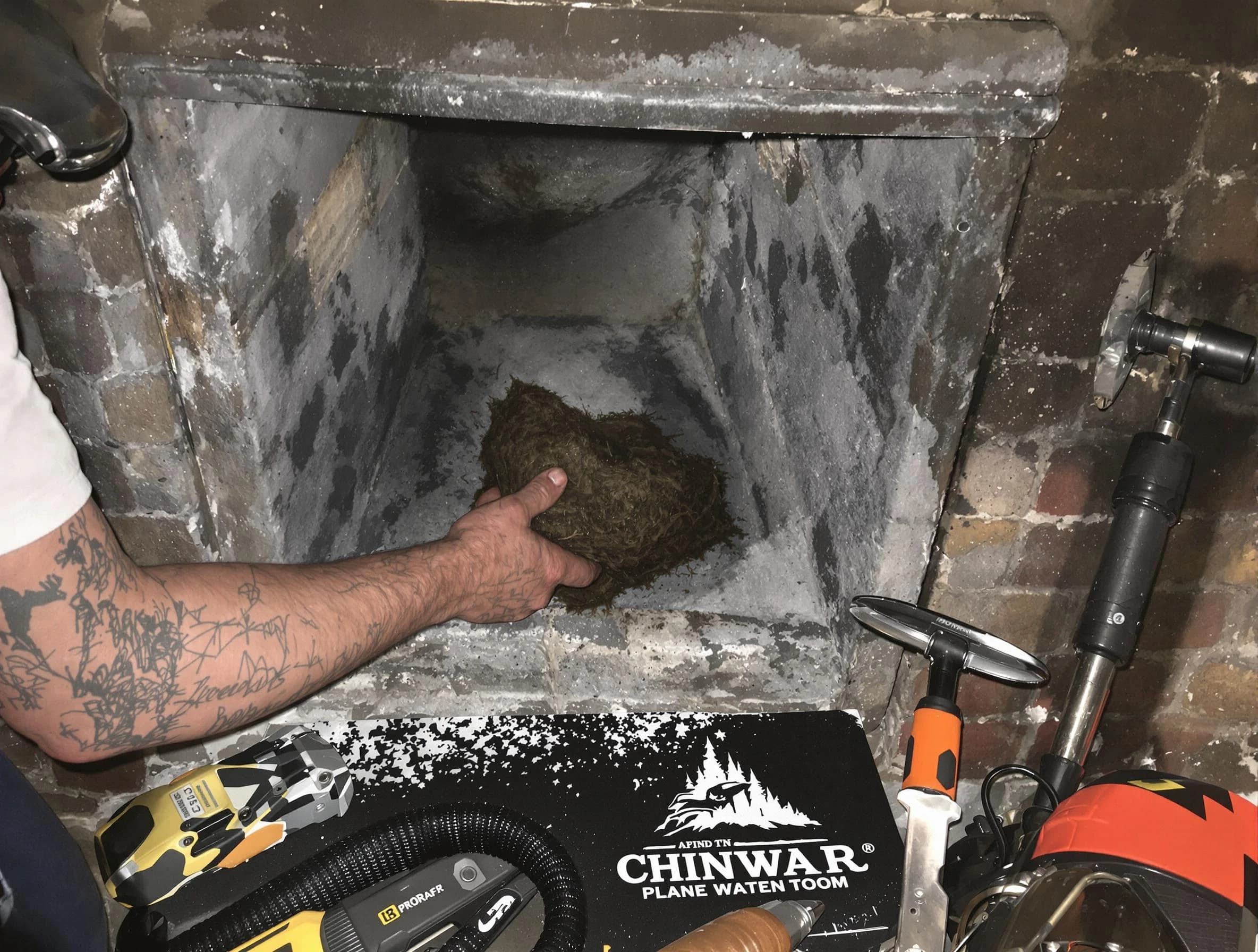 Carteret Chimney Sweep safely removing debris and screening chimney in Carteret, NJ